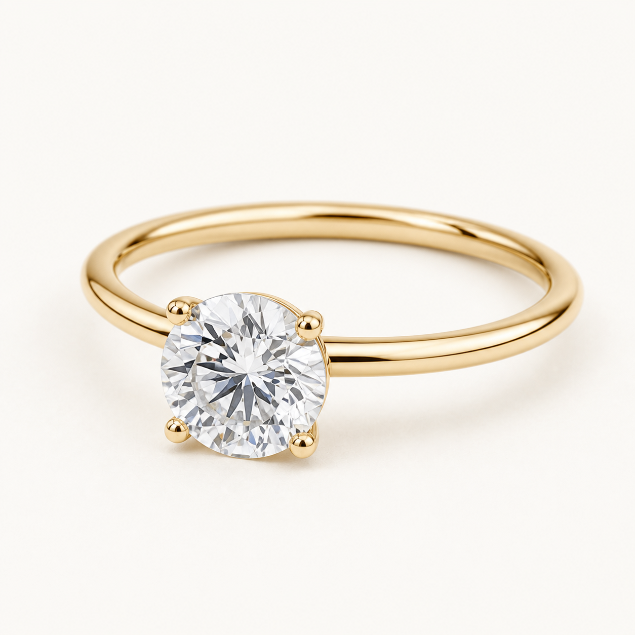 Zurich con diamante redondo en oro amarillo, vista frontal